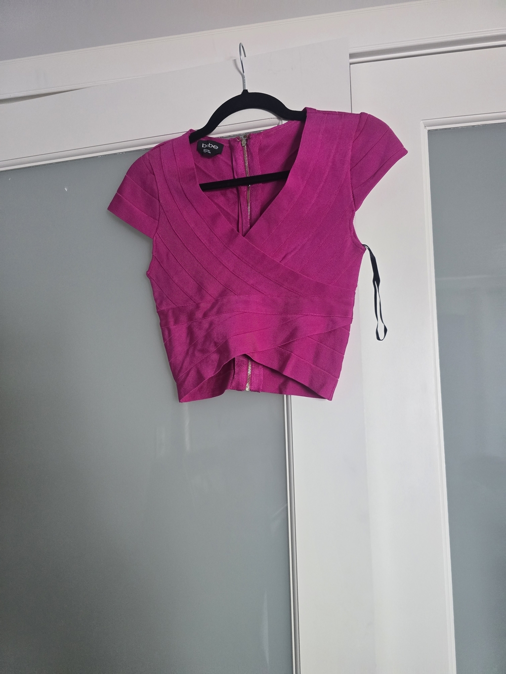 bebe Fuchsia Bandage V‑Neck Crop Top